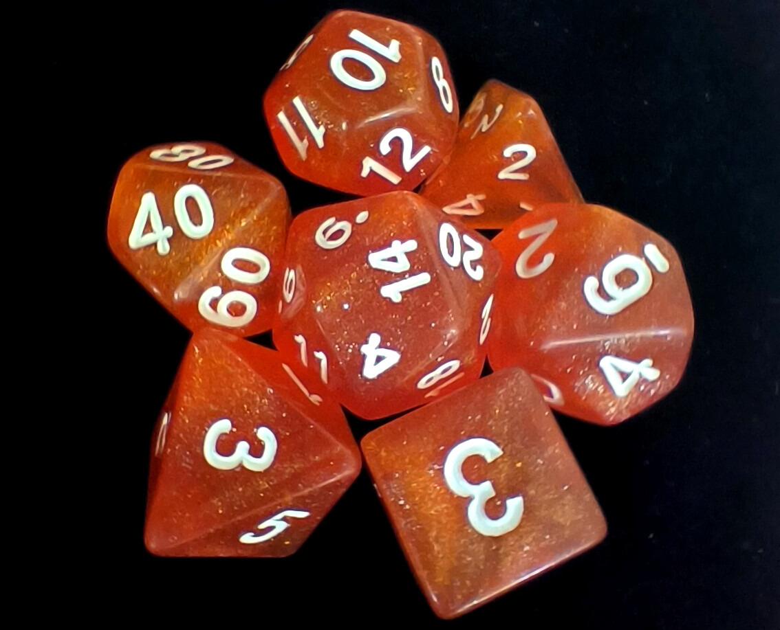 Набор кубиков для RPG 7 шт.  прозрачные оранжевые с блестками